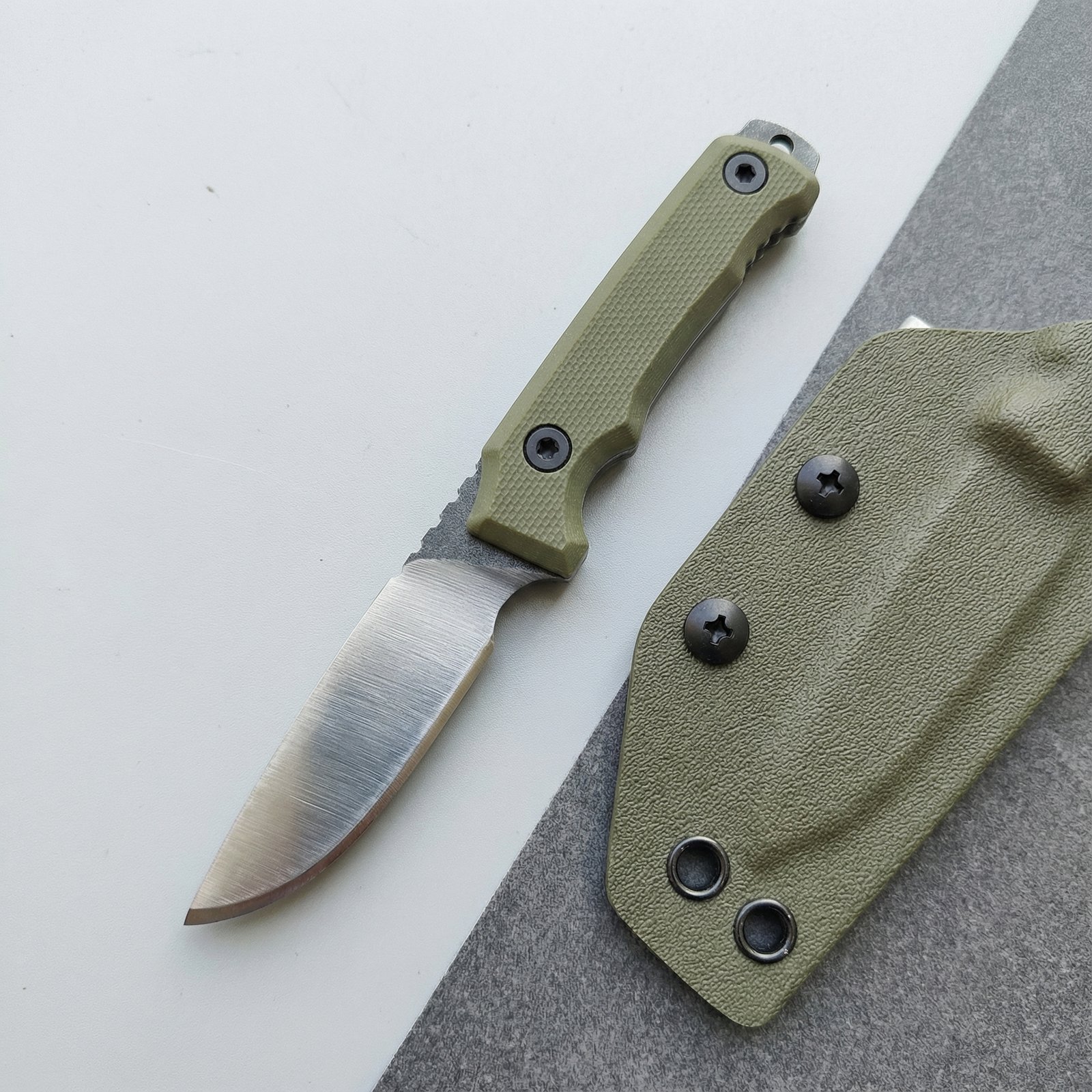 EDC fixed blade knife with compact thermoplastic sheath for everyday carry